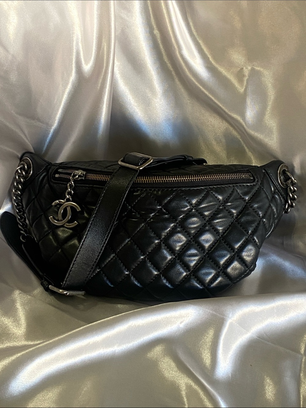 CHANEL Black Quilted Leather Mini Belt Bag with CC Charm